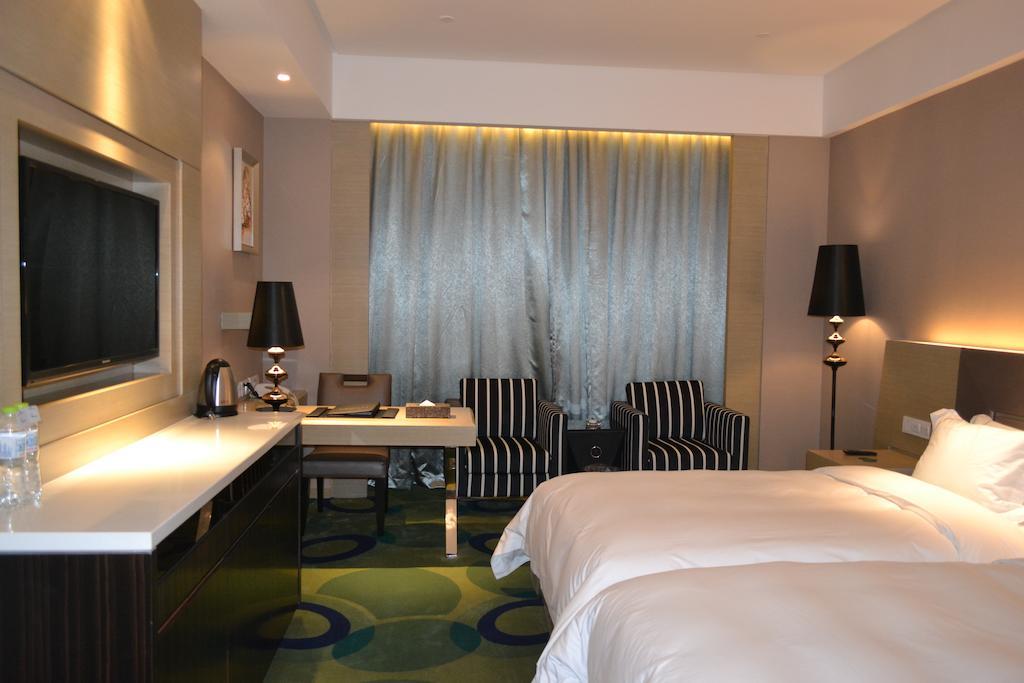 Angel Garden Hotel Hohhot Zimmer foto