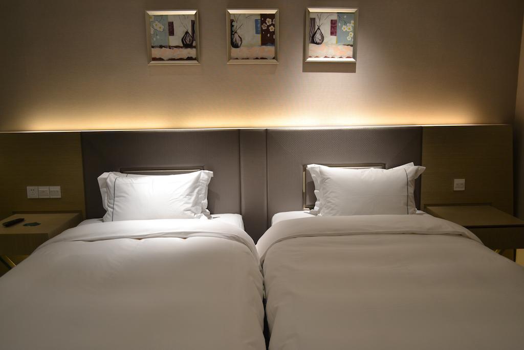 Angel Garden Hotel Hohhot Zimmer foto